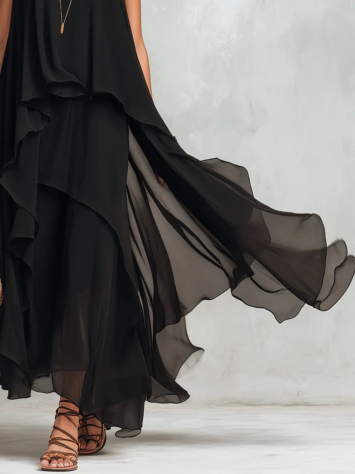 Vestido maxi negro de gasa en capas, cuello redondo y sin mangas