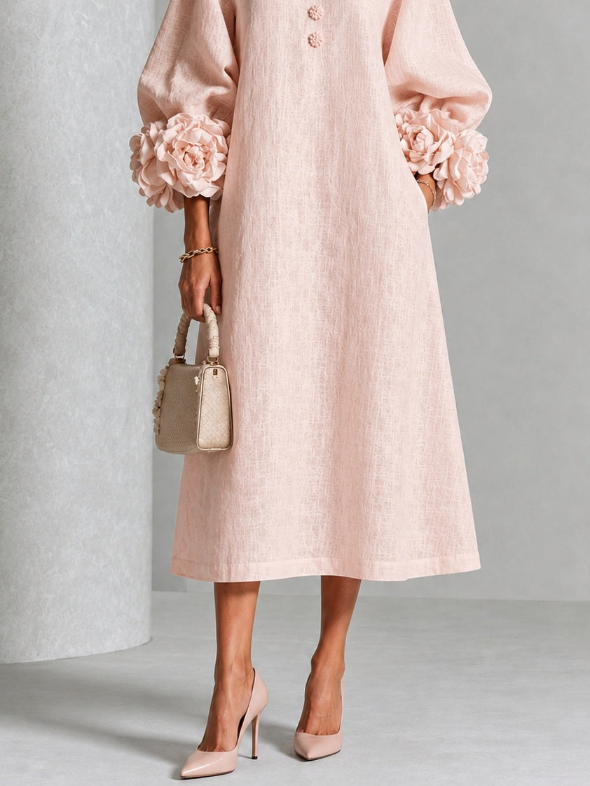 Vestido midi floral rosa abotonado con llamativos puños florales