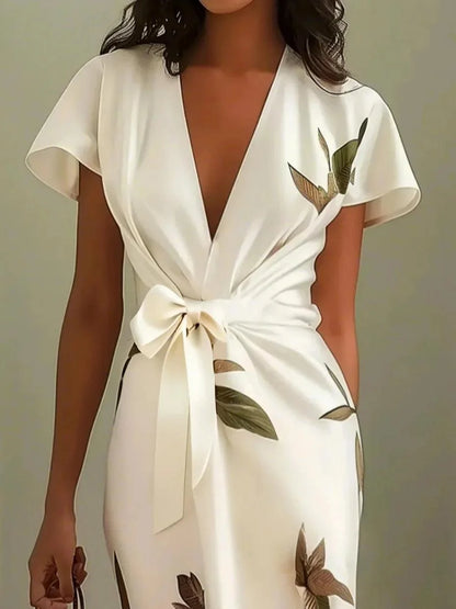 Vestido midi cruzado de satén blanco con hojas y manga corta