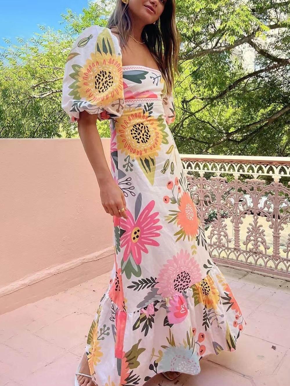Vestido largo con estampado floral, escote cuadrado y manga abullonada