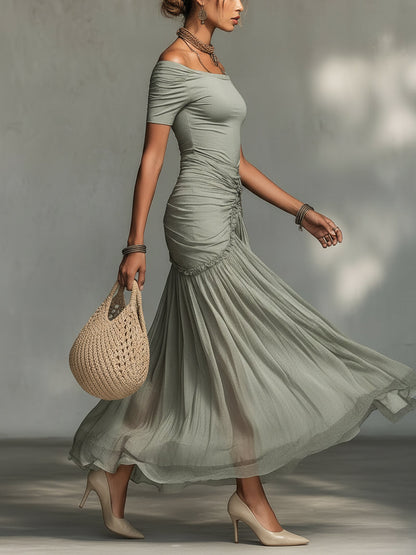 Vestido maxi gris de tejido elástico y gasa