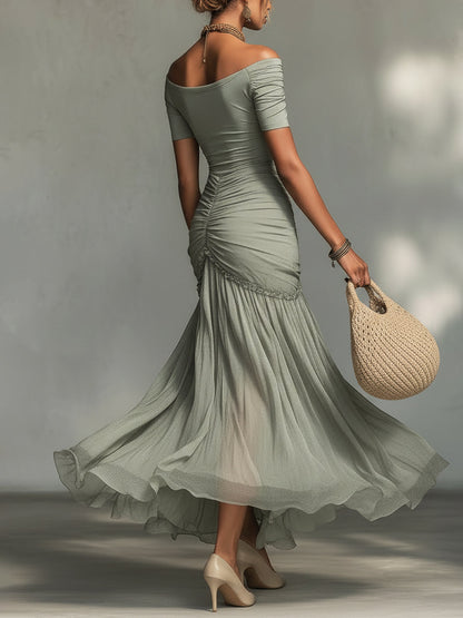 Vestido maxi gris de tejido elástico y gasa