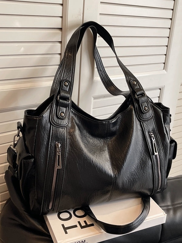 Bolso tote de gran capacidad con tachuelas