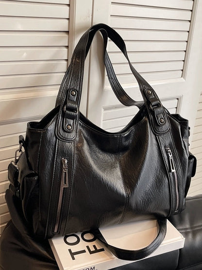 Bolso tote de gran capacidad con tachuelas