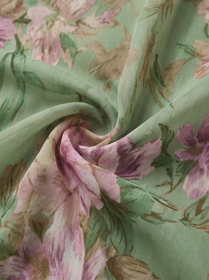 Vestido largo de gasa verde con flores y cuello halter