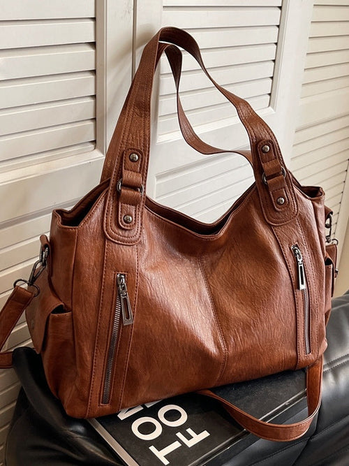 Bolso tote de gran capacidad con tachuelas