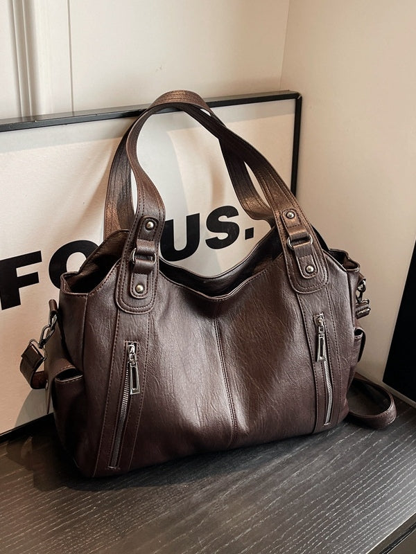 Bolso tote de gran capacidad con tachuelas