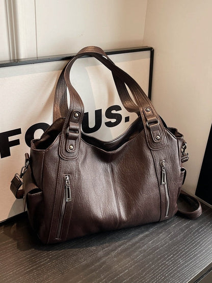 Bolso tote de gran capacidad con tachuelas