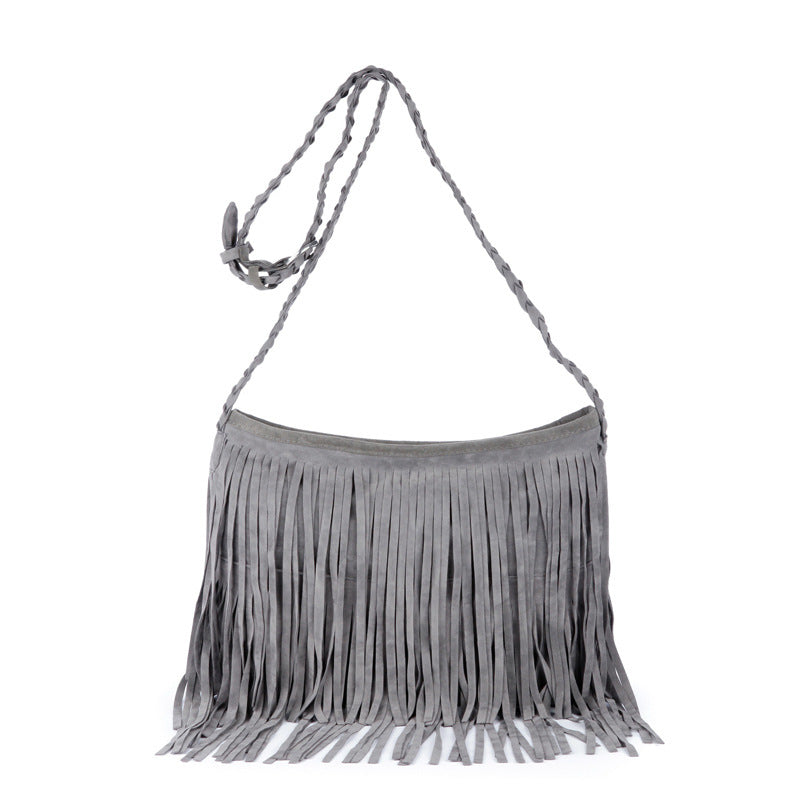 Bolso bandolera de hombro con flecos y acabado esmerilado