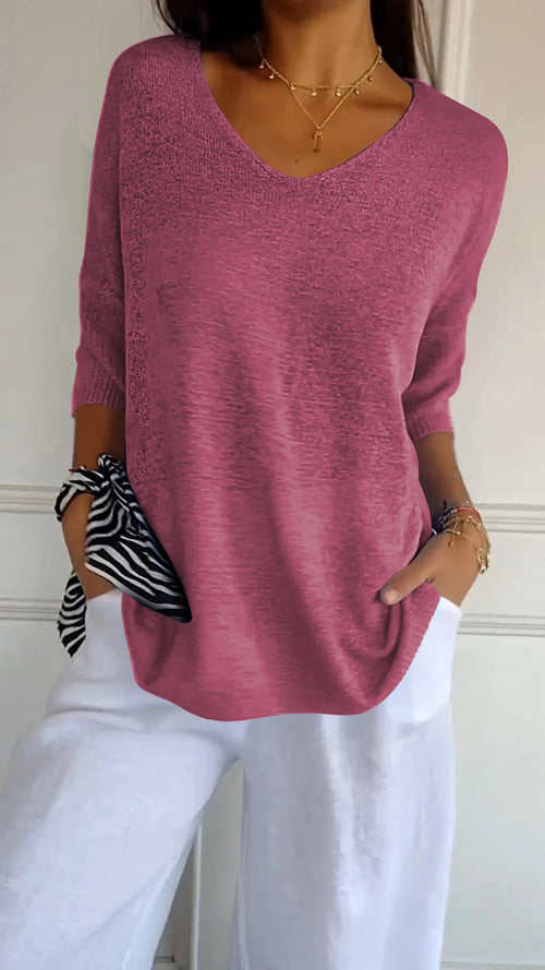 Top de punto liso con cuello en V