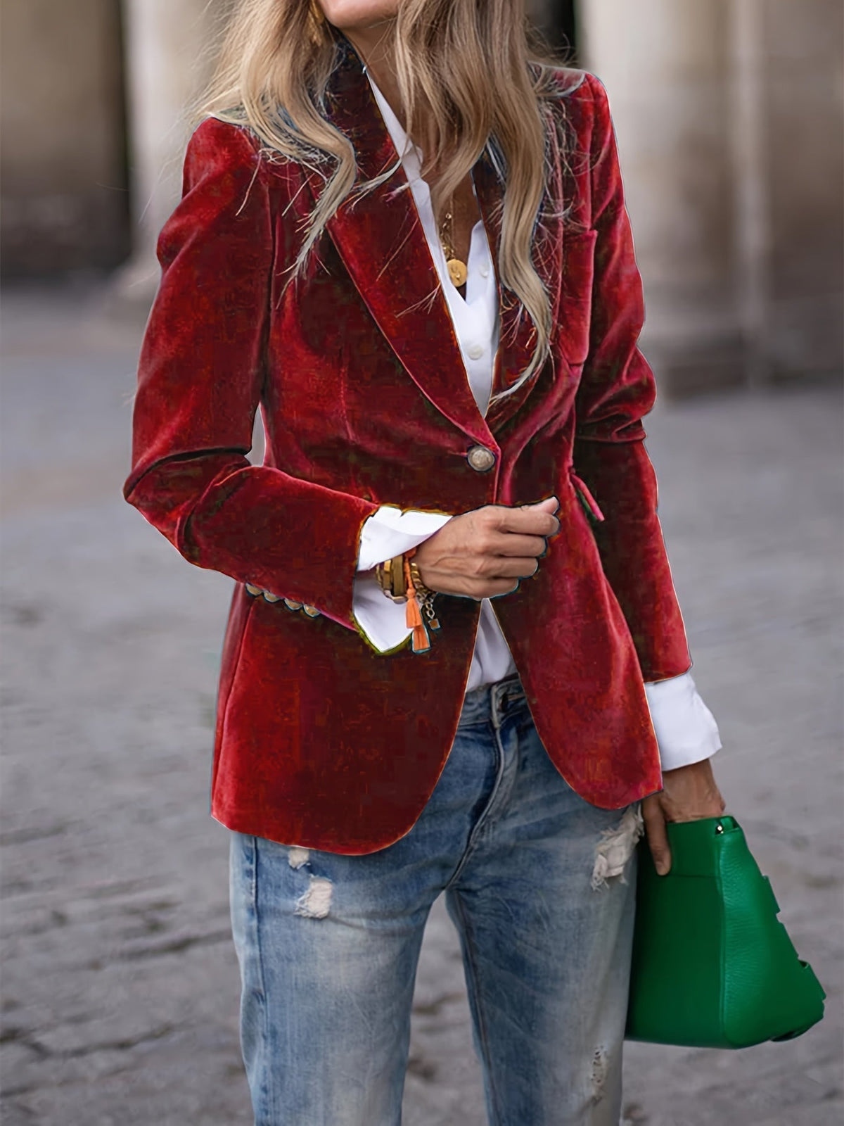 Blazer elegante de terciopelo entallado con bolsillos simulados