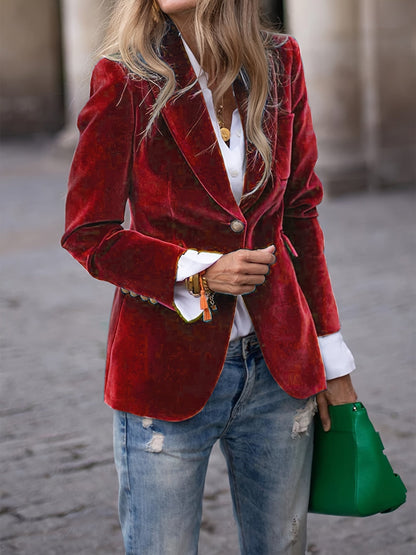 Blazer elegante de terciopelo entallado con bolsillos simulados
