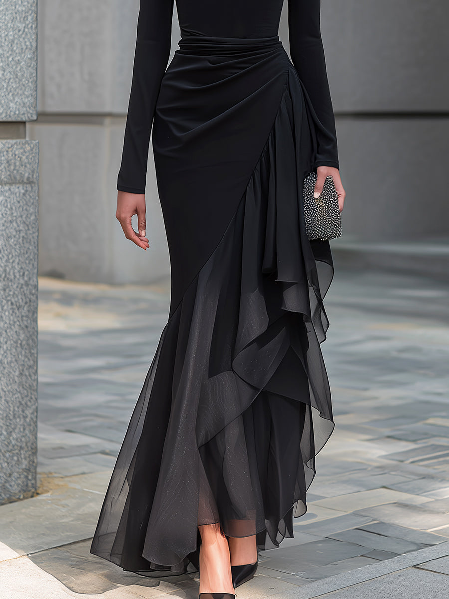 Vestido maxi sirena negro drapeado de hombros descubiertos, cuello desbocado, manga larga y volantes de gasa