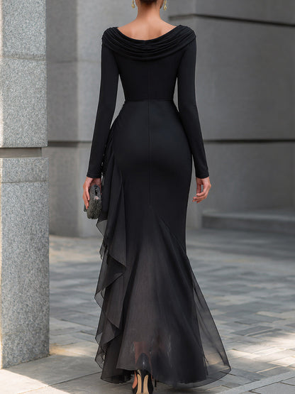 Vestido maxi sirena negro drapeado de hombros descubiertos, cuello desbocado, manga larga y volantes de gasa