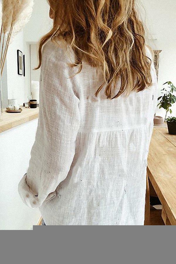 Blusa casual lisa con botones y cuello camisero