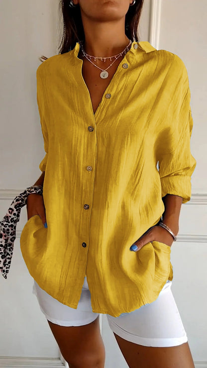 Camisa plisada con solapa y botones