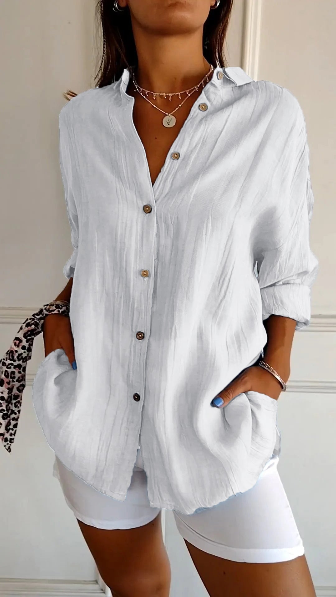Camisa plisada con solapa y botones