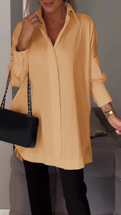 Camisa blanca con solapa y aberturas