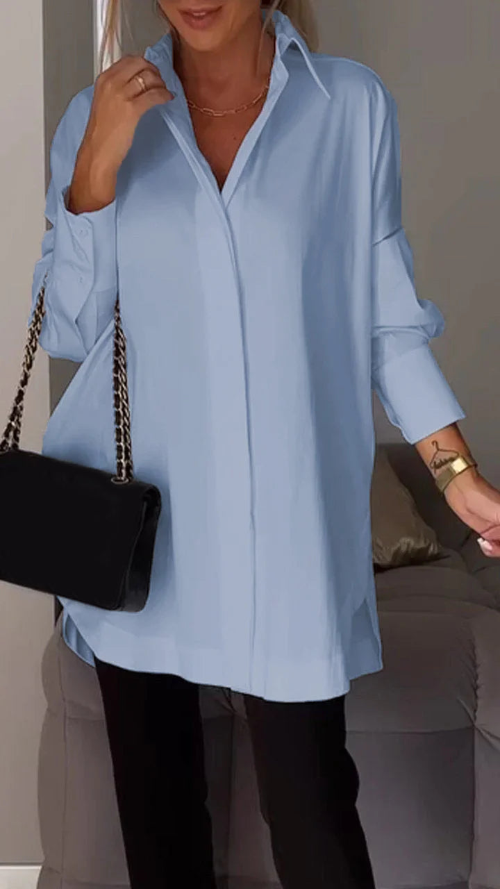 Camisa blanca con solapa y aberturas