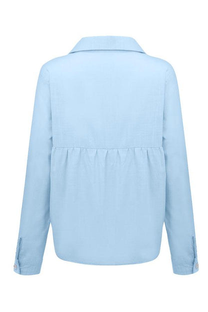 Blusa casual lisa con botones y cuello camisero