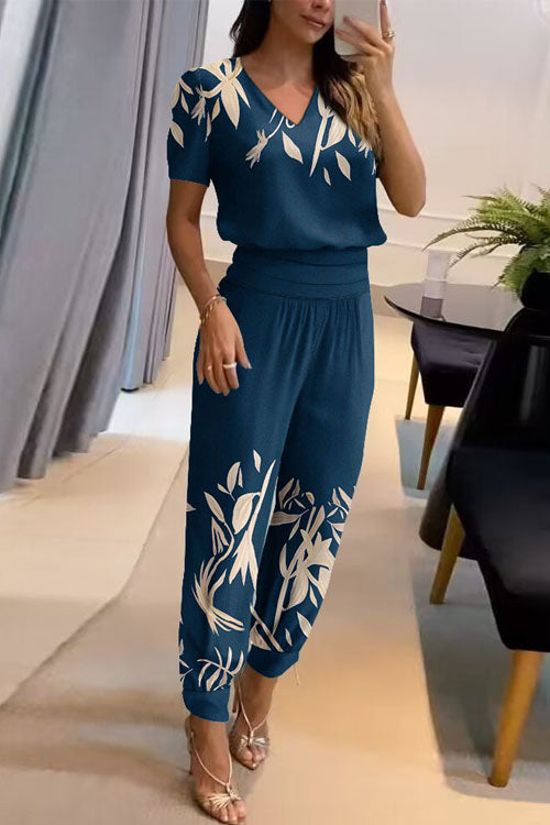 Conjunto casual de dos piezas: top estampado de manga corta con cuello en V y pantalón largo