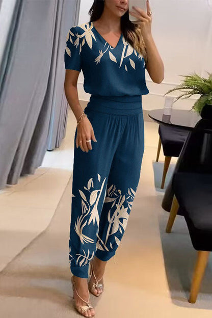 Conjunto casual de dos piezas: top estampado de manga corta con cuello en V y pantalón largo