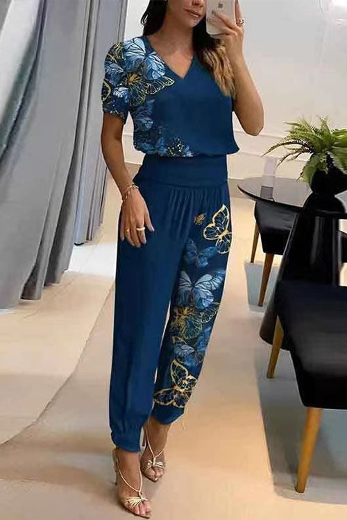Conjunto casual de dos piezas: top estampado de manga corta con cuello en V y pantalón largo