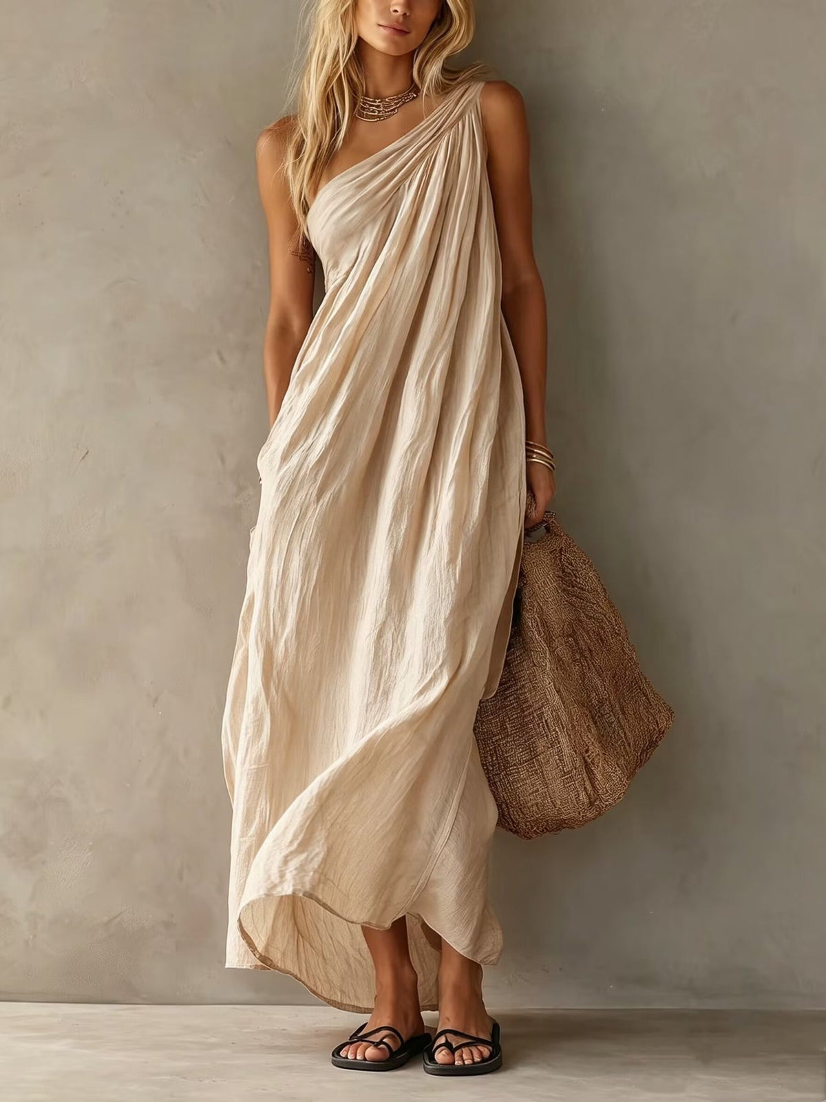 Elegante vestido largo rosa asimétrico sin mangas