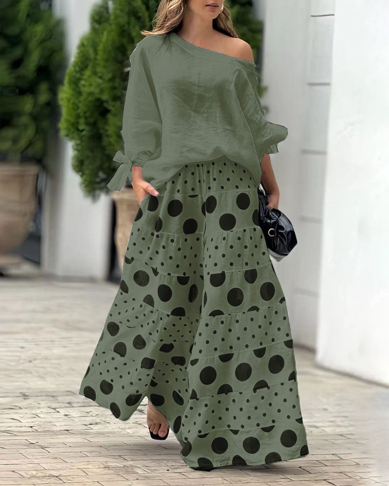Conjunto casual de dos piezas: top de hombros y pantalón estampado