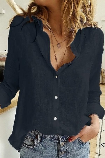 Blusa casual lisa con botones y cuello camisero