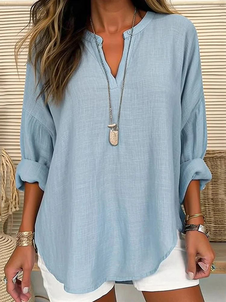 Blusa casual holgada lisa de manga larga con cuello en V