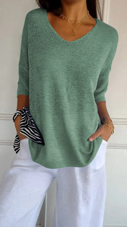 Top de punto liso con cuello en V