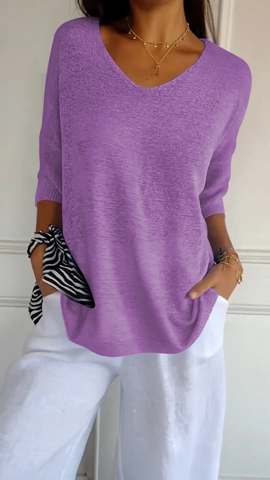 Top de punto liso con cuello en V