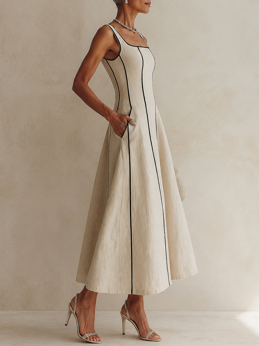 Vestido largo minimalista en línea A color albaricoque con vivos negros