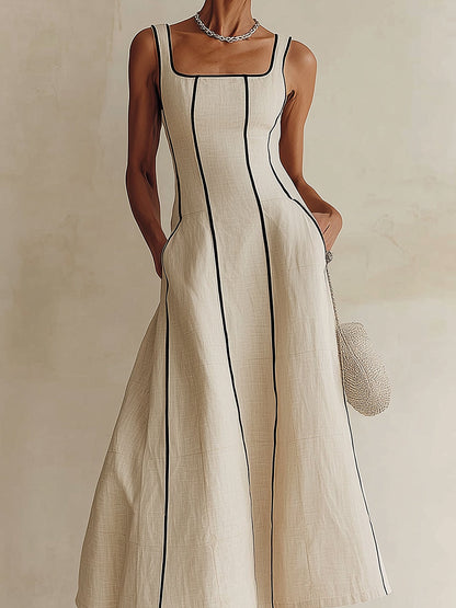 Vestido largo minimalista en línea A color albaricoque con vivos negros