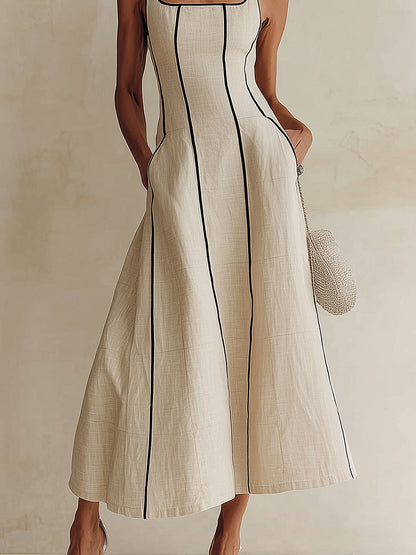 Vestido largo minimalista en línea A color albaricoque con vivos negros