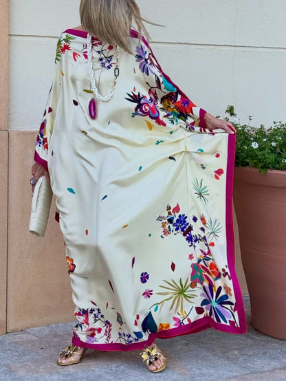 Elegante túnica maxi holgada de satén estampado