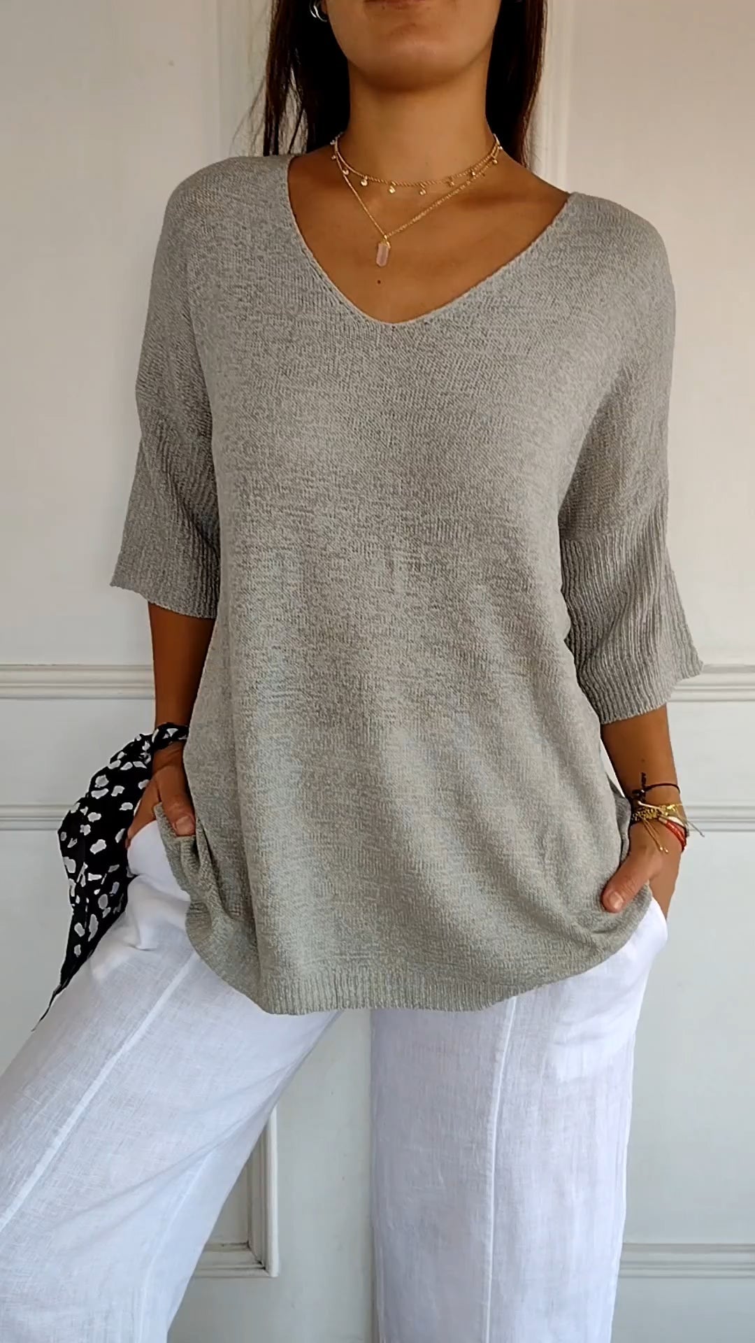 Top de punto liso con cuello en V