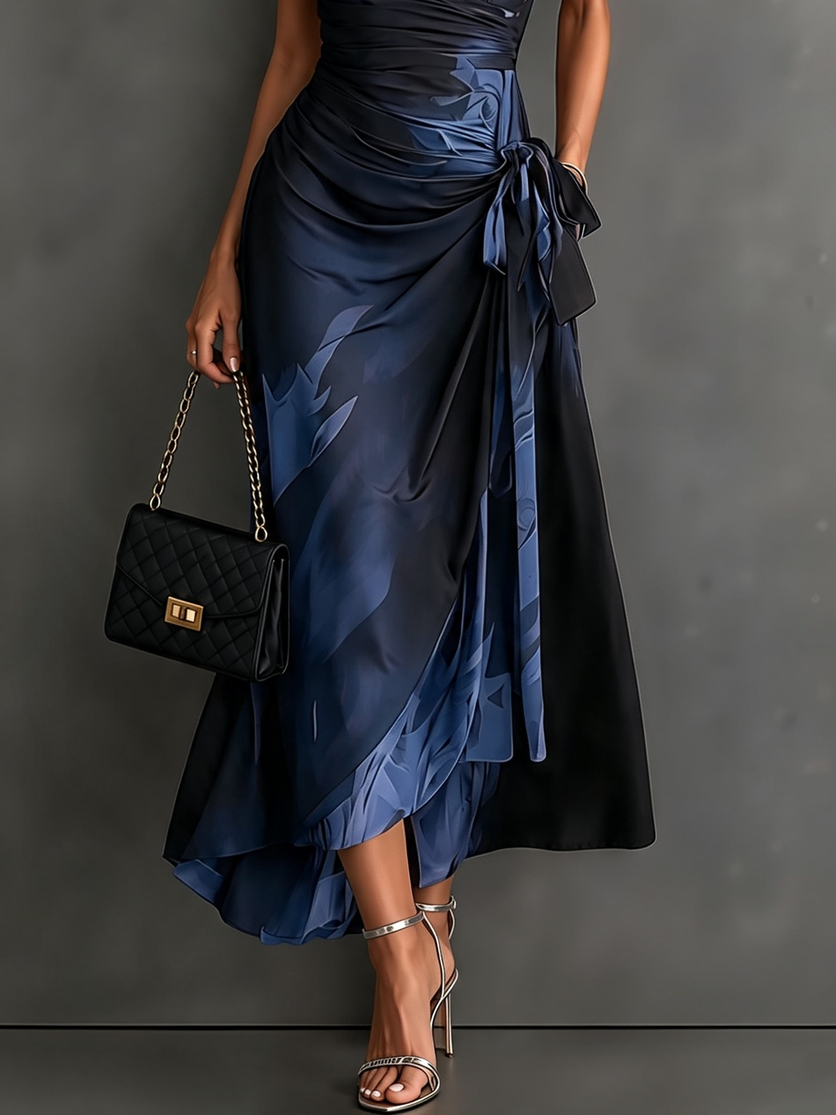 Vestido midi cruzado con estampado abstracto rojo y negro, cuello camisero en V, manga corta, lazo en la cintura y bajo asimétrico con volantes