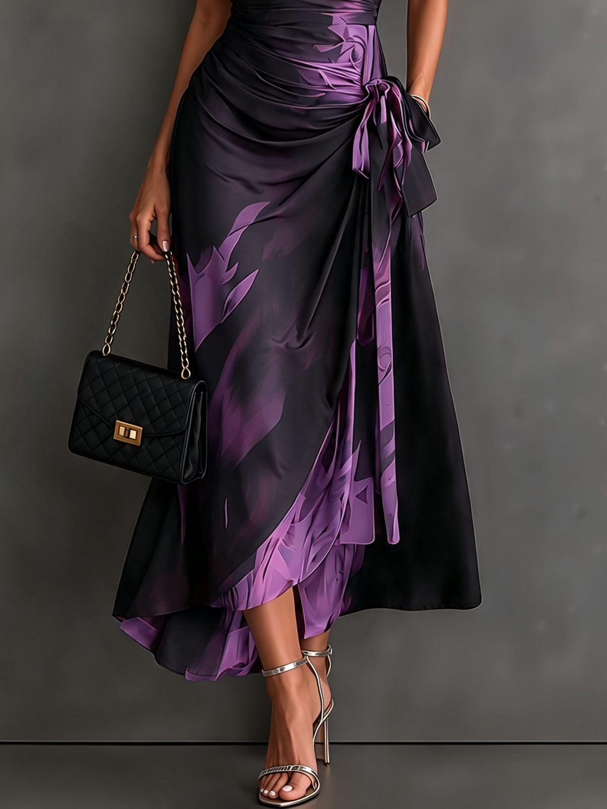 Vestido midi cruzado con estampado abstracto rojo y negro, cuello camisero en V, manga corta, lazo en la cintura y bajo asimétrico con volantes