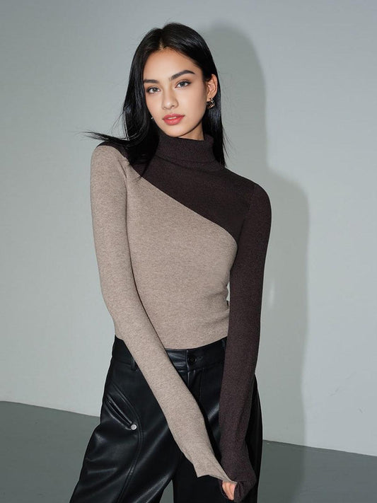 Top de punto de manga larga con cuello perkins y patchwork asimétrico