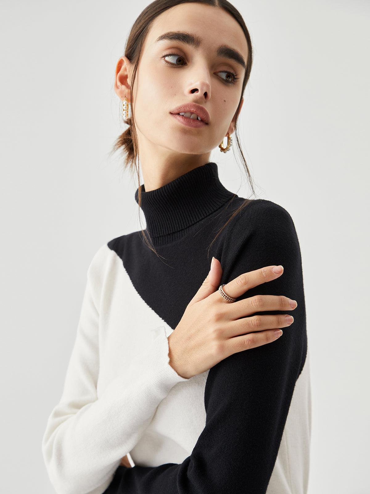 Top de punto de manga larga con cuello perkins y patchwork asimétrico