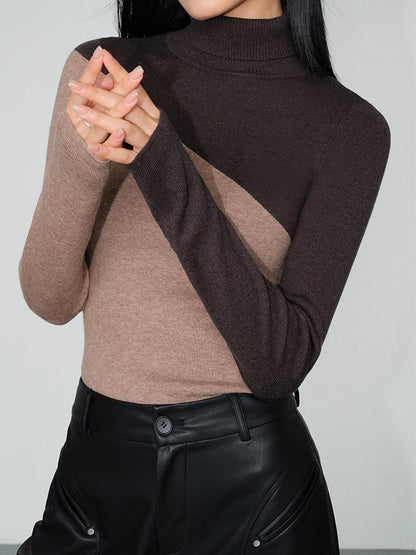 Top de punto de manga larga con cuello perkins y patchwork asimétrico