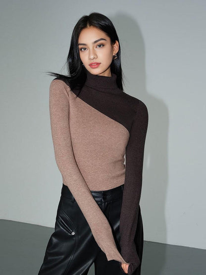 Top de punto de manga larga con cuello perkins y patchwork asimétrico