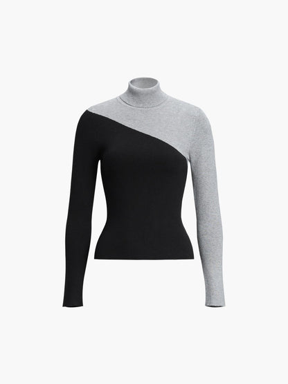 Top de punto de manga larga con cuello perkins y patchwork asimétrico