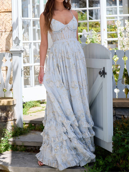 Vestido largo floral con volantes y abertura