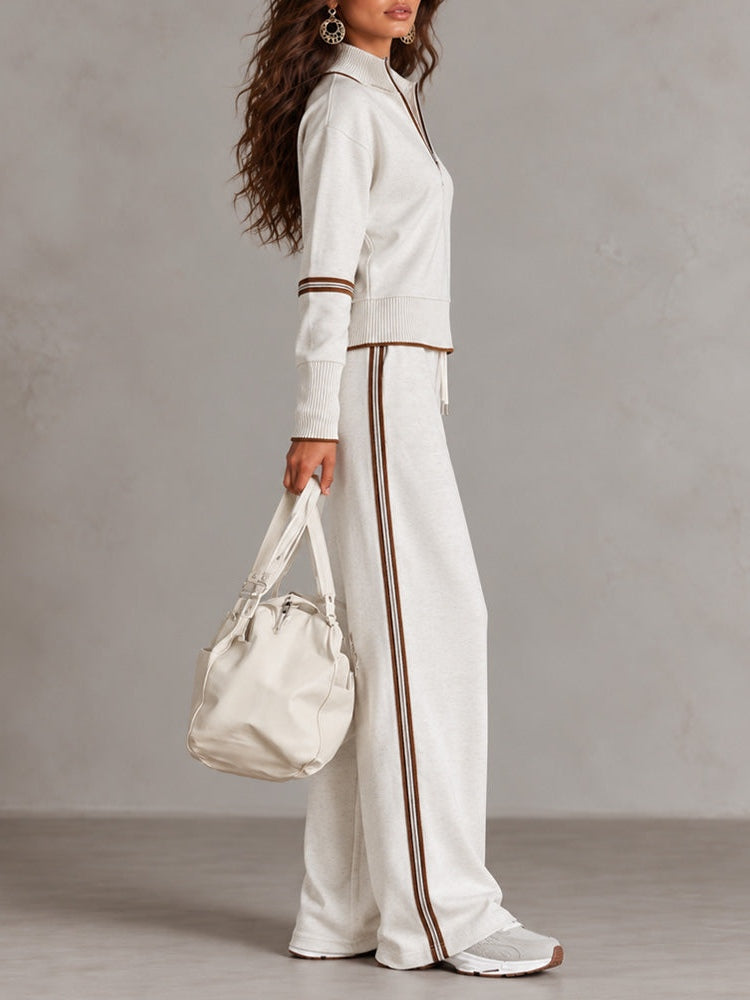 Conjunto blanco de sudadera de canalé con media cremallera y pantalón de pierna ancha bicolor