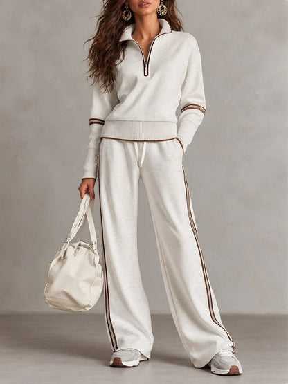Conjunto blanco de sudadera de canalé con media cremallera y pantalón de pierna ancha bicolor