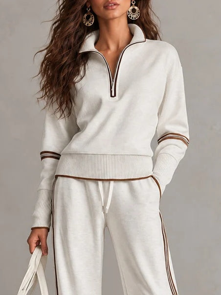 Conjunto blanco de sudadera de canalé con media cremallera y pantalón de pierna ancha bicolor