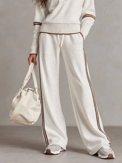 Conjunto blanco de sudadera de canalé con media cremallera y pantalón de pierna ancha bicolor